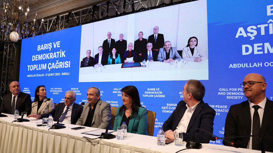 FILE PHOTO: Ahmet Turk, Pervin Buldan, Sirri Sureyya Onder, Tulay Hatimogullari, Tuncer Bakirhan, Cengiz Cicek and Faik Ozgur Erol, politicians and lawmakers from the pro-Kurdish Peoples' Equality and Democracy Party (DEM Party), with a picture take in Imrali Island prison with the jailed Kurdish militant leader Abdullah Ocalan, in the background, attend a press conference in Istanbul, Turkey, February 27, 2025. REUTERS/Umit Bektas/File Photo