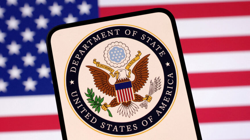 FILE PHOTO: United States Department of State logo and U.S. flag are seen in this illustration created on April 23, 2025. REUTERS/Dado Ruvic/Illustration/File Photo