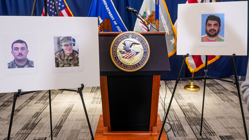 Pictures of National Guard members Andrew Wolfe and Sarah Beckstrom, who were shot on November 26 in Washington, are displayed next to a picture of the suspect of the shooting, Afghan national Rahmanullah Lakanwal, on the day of a press conference with FBI Director Kash Patel, U.S. Attorney for D.C. Jeanine Pirro and other authorities, in Washington, D.C., U.S., November 27, 2025. REUTERS/Nathan Howard