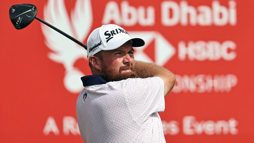 Shane Lowry driving toward a first-round 64 in Abu Dhabi 