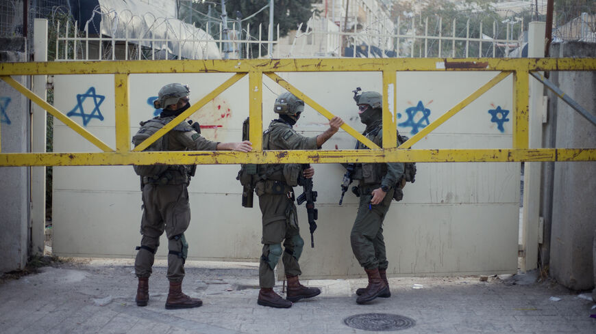 Israeli soldiers patrol in Hebron, West Bank, on Nov. 8, 2025.