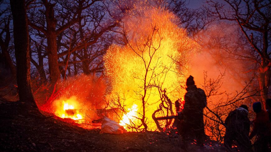 This picture obtained from Iran's ISNA news agency shows a view of the fire in the forests of Chalus on Nov. 21, 2025.