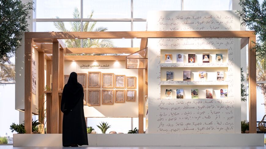 Visitors at the exhibition of Folk Poetry at the Waterfront of Kalba, Sharjah.