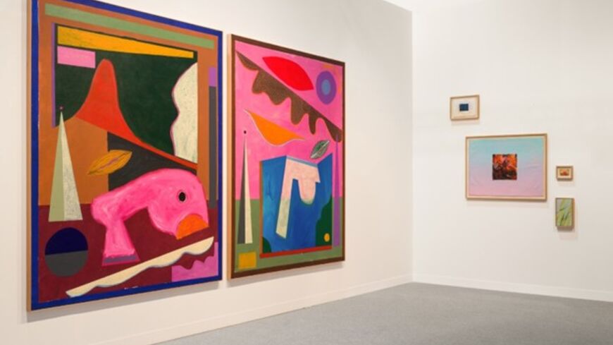 A view of the booth of Dubai-based Tabari Artspace featuring the work of Saudi painter Nasser Almulhim (left). (Courtesy of Tabari Artspace)