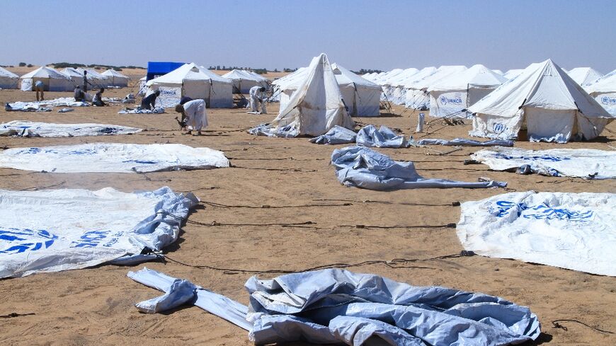Exhausted health workers have been treating patients in makeshift tents at Al-Dabbah camp in Sudan after fleeing El-Fasher