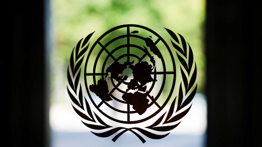 The United Nations logo adorns a window at U.N. headquarters in New York City, U.S., September 18, 2025. REUTERS/Jeenah Moon