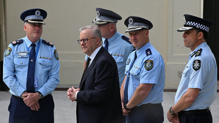 Australia's Prime Minister Anthony Albanese visits the scene of the attack on a Jewish holiday celebration at Sydney's Bondi Beach, in Sydney, Australia, December 15, 2025. REUTERS/Flavio Brancaleone