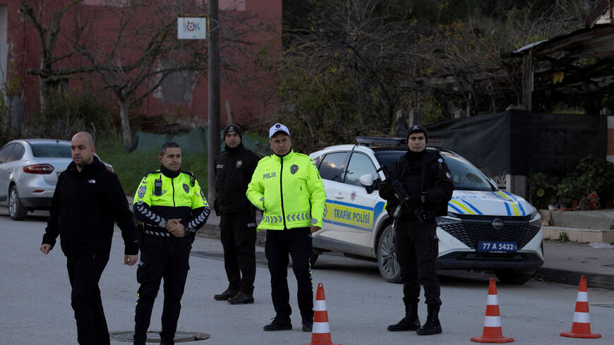 Police block a road leading to a site where Turkish police launched an operation on a house believed to contain suspected Islamic State militants, and where, according to state media, seven officers were wounded in a clash, in Yalova province, Turkey, December 29, 2025. REUTERS/Umit Bektas