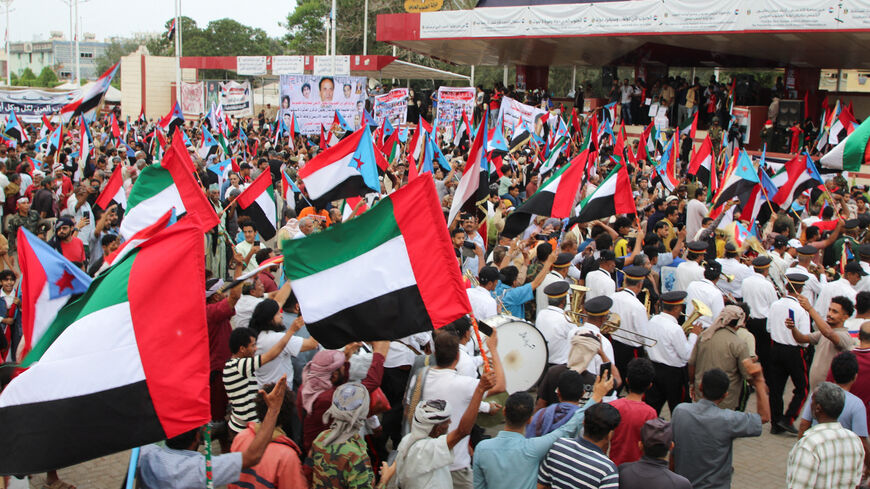 Supporters of the UAE-backed separatist Southern Transitional Council (STC) wave flags of the United Arab Emirates and of the STC, during a rally in Aden, Yemen, December 30, 2025. REUTERS/Fawaz Salman