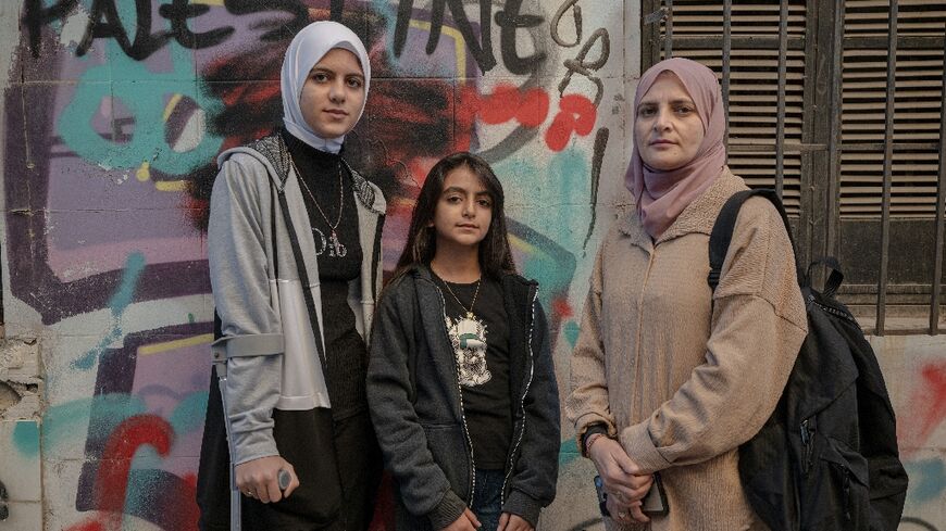 Raghad (L) is one of 10 Gazan minors in Athens who suffer from severe injuries