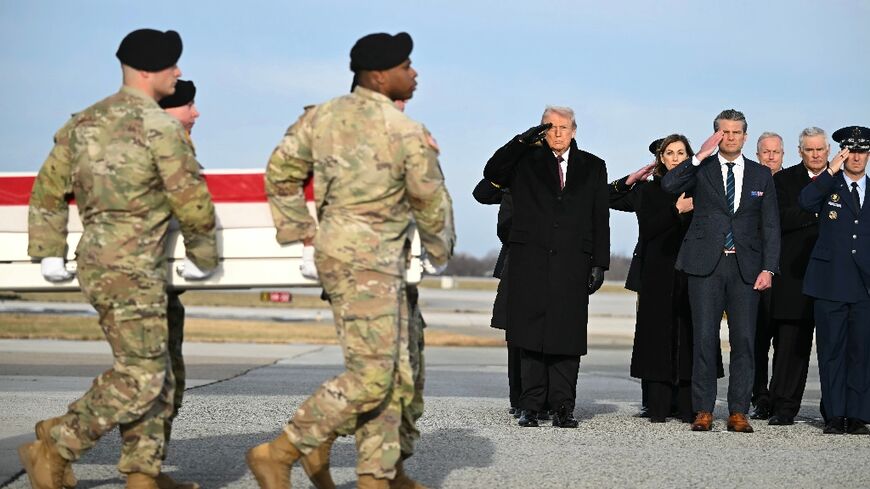 US President Donald Trump, Pentagon chief Pete Hegseth and other officials attend a ceremony marking the return of the bodies of three Americans killed in Syria