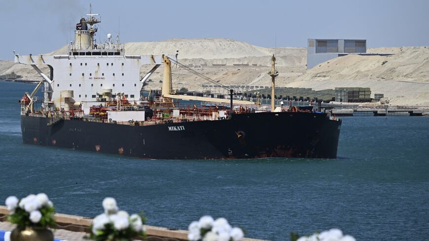 A ship sails along Egypt's Suez Canal near Ismailia, April 16, 2025. 