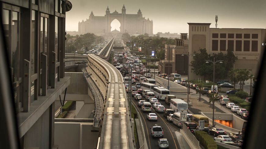 A picture taken from a station of Dubai's Palm Monorail shows traffic on a road in Palm Jumeirah on Aug. 28, 2025. 