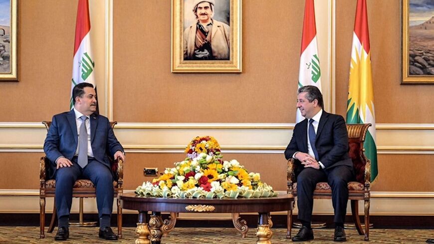 KRG Prime Minister Masrour Barzani (R) and Iraqi Prime Minister Mohammed Shia al-Sudani (L) meet in Irbil on April 12, 2025.