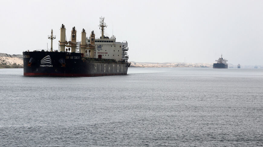 FILE PHOTO: Ships move through the Suez Canal, in Ismalia, Egypt, July 31, 2025. REUTERS/Mohamed Abd El Ghany/File Photo
