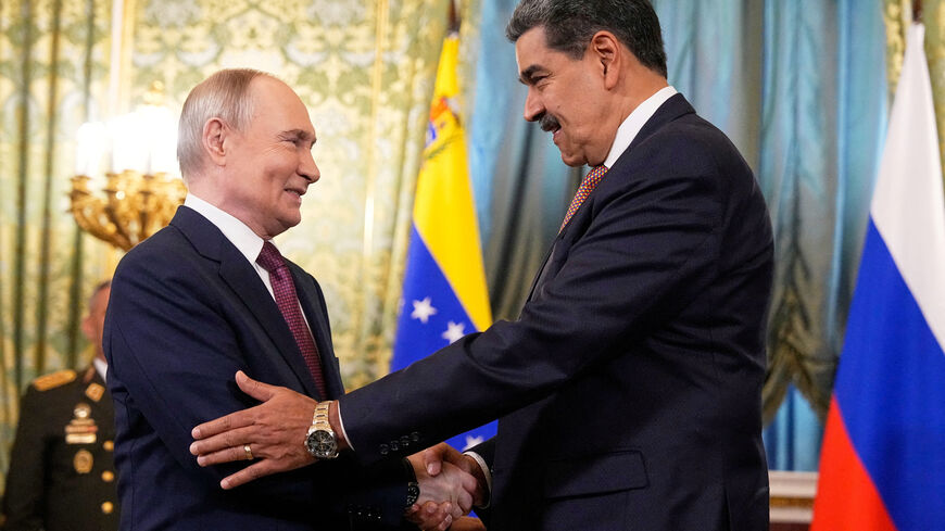 FILE PHOTO: Russian President Vladimir Putin welcomes his Venezuelan counterpart Nicolas Maduro during a meeting at the Kremlin in Moscow, Russia, May 7, 2025. Alexander Zemlianichenko/Pool via REUTERS/File Photo