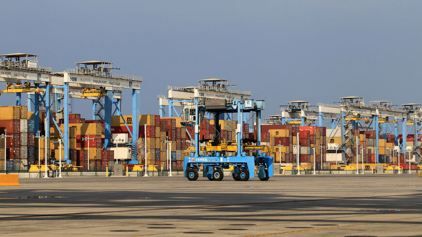 Containers are seen at Abu Dhabi's Khalifa Port after it was expanded in Abu Dhabi, UAE, December 11, 2019. REUTERS/Satish Kumar