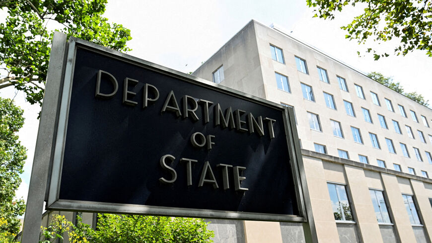 FILE PHOTO: A general view of a U.S. State Department sign outside the U.S. State Department building in Washington, D.C., U.S., July 11, 2025. REUTERS/Annabelle Gordon/File Photo