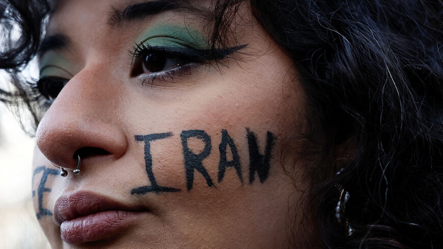 A demonstrator attends rally in support of Iranian people amid anti-government protests raging across Iran, in Paris, France, January 11. REUTERS/Benoit Tessier