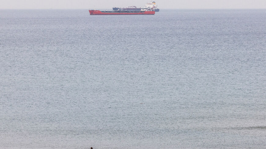 FILE PHOTO: Commercial vessels, including oil tankers, wait at an anchorage in the Black Sea off Kilyos near Istanbul, Turkey, December 9, 2022. REUTERS/Umit Bektas/File Photo