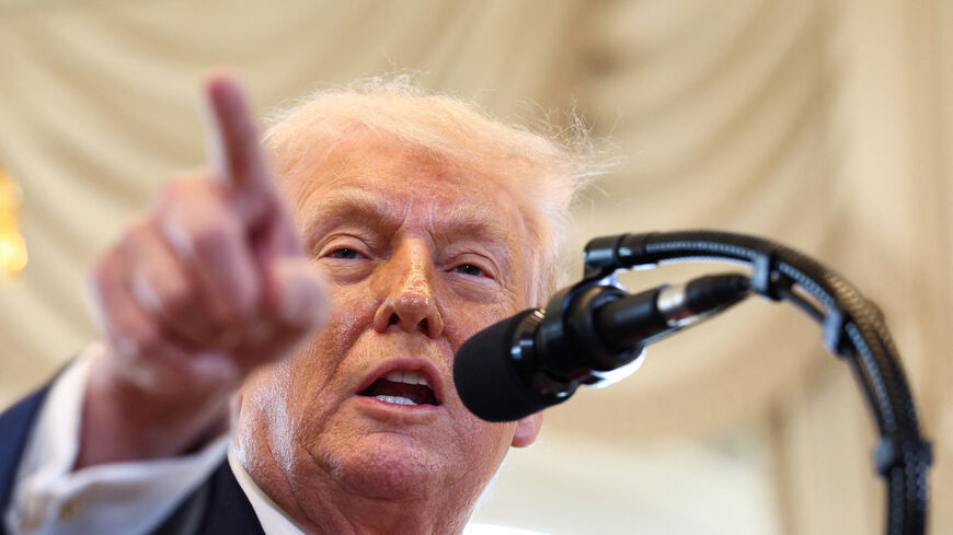 U.S. President Donald Trump speaks at a ceremony in Palm Beach,  Florida, U.S., January 16, 2026.  REUTERS/Kevin Lamarque