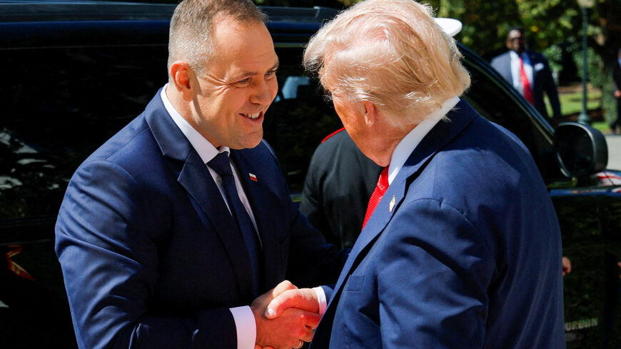 U.S. President Donald Trump greets the President of Poland Karol Nawrocki at the White House in Washington, D.C., U.S., September 3, 2025. REUTERS/Brian Snyder