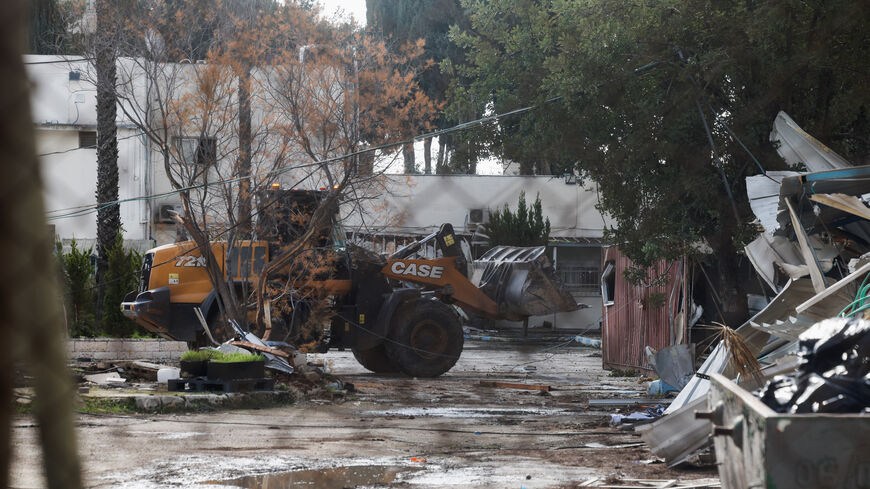Heavy machinery operates as Israeli forces dismantle the Jerusalem headquarters of the United Nations Relief and Works Agency for Palestine Refugees (UNRWA), in East Jerusalem, January 20, 2026. REUTERS/Ammar Awad
