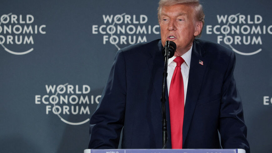 FILE PHOTO: U.S. President Donald Trump speaks during a reception with business leaders at the 56th annual World Economic Forum (WEF), in Davos, Switzerland, January 21, 2026. REUTERS/Jonathan Ernst/File Photo