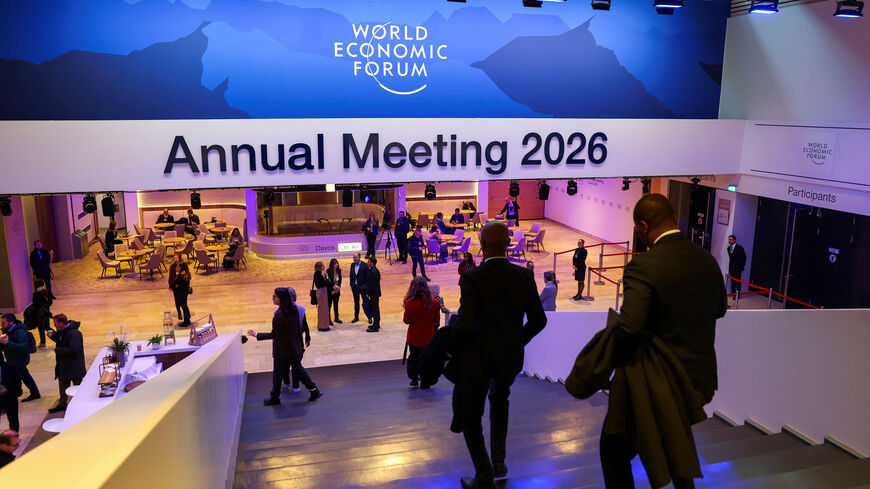 People walk on the last day of the 56th annual World Economic Forum (WEF) meeting in Davos, Switzerland, January 23, 2026. REUTERS/Denis Balibouse