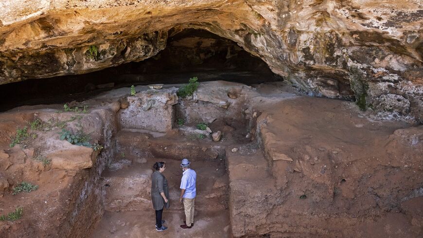 Archaeologists at the entrance of the Contrebandiers (Smugglers) Cave, some 12 miles from the Moroccan capital, Rabat, Sept. 18, 2021.