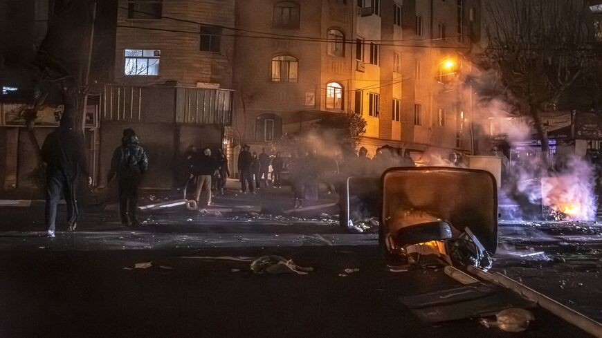 Iranians gather while blocking a street during a protest in Tehran, Iran, on Jan. 9, 2026. 