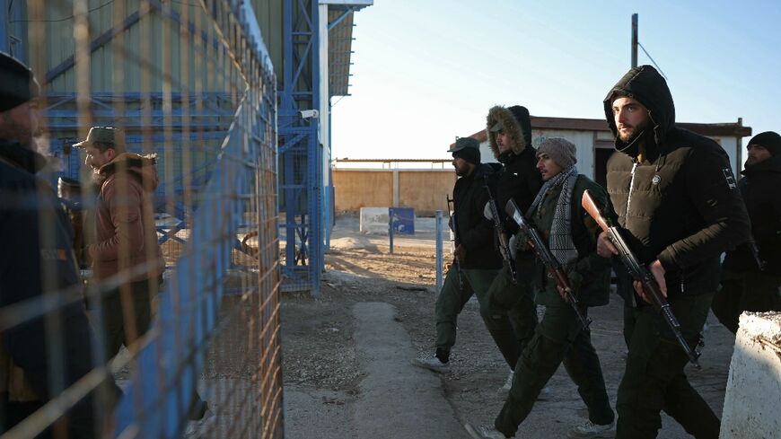 At Al-Hol, an AFP correspondent saw soldiers open the camp's metal gate and enter, while others stood guard