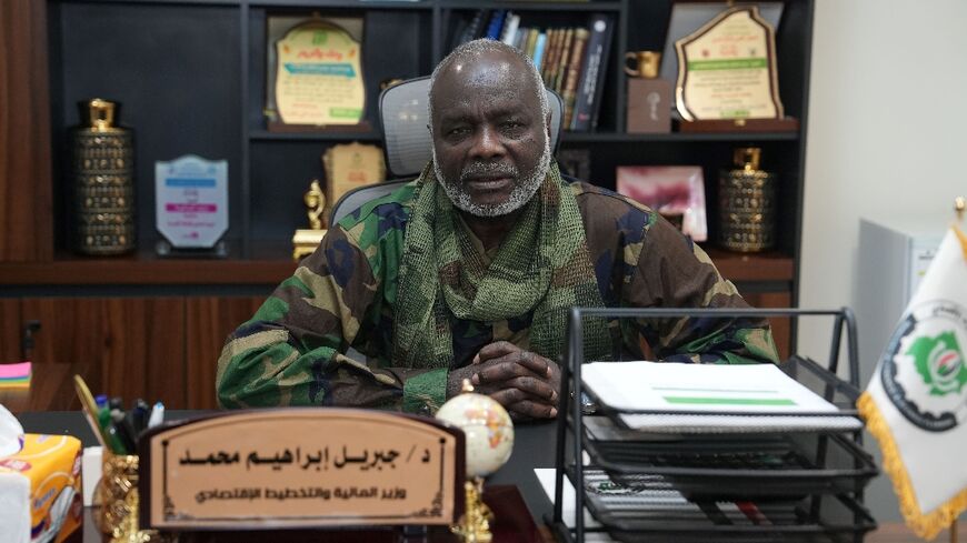 Sudan's Finance Minister Gibril Ibrahim speaks with AFP during an interview in Port Sudan