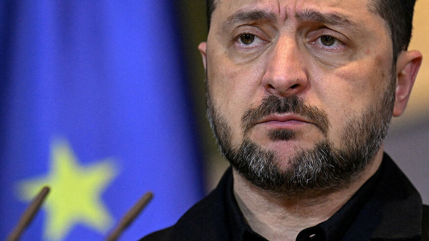 FILE PHOTO: Ukrainian President Volodymyr Zelenskiy attends a press conference with German Chancellor Friedrich Merz, at the Chancellery in Berlin, Germany December 15, 2025. REUTERS/Annegret Hilse/File Photo