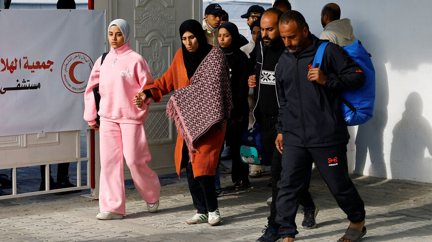 A Palestinian patient, accompanied by relatives, make their way back to their homes after being informed by officials that their travel scheduled for today through the Rafah border crossing was postponed, in Khan Younis in the southern Gaza Strip, February 4, 2026. REUTERS/Mahmoud Issa