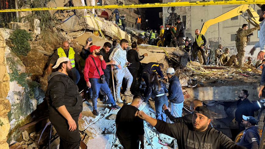 Rescue teams search for survivors after a building collapsed in Tripoli, Lebanon, February 8, 2026. REUTERS/Omar Ibrahim