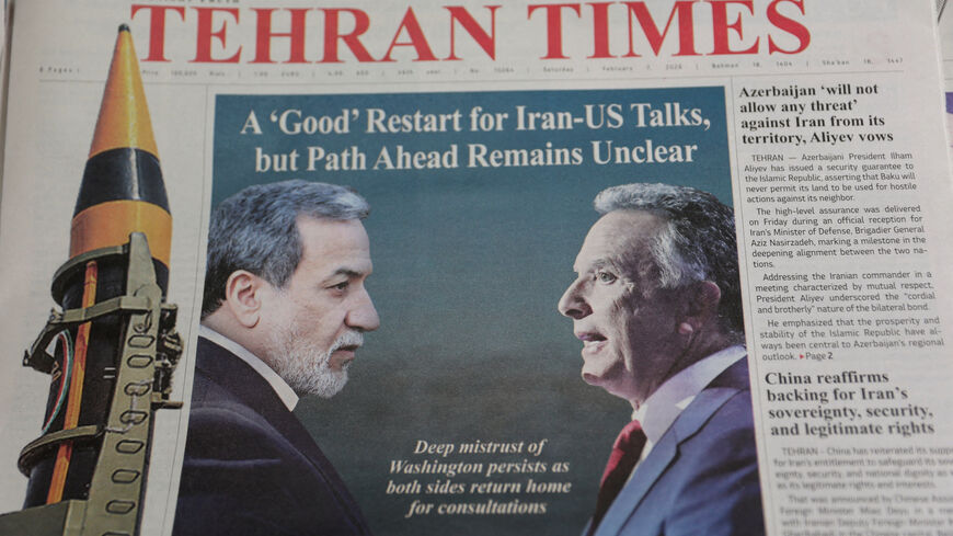 FILE PHOTO: An Iranian newspaper with a cover photo of Iran's Foreign Minister Abbas Araqchi and U.S. Middle East envoy Steve Witkoff, in Tehran, Iran, February 7, 2026. Majid Asgaripour/WANA (West Asia News Agency) via REUTERS/File Photo
