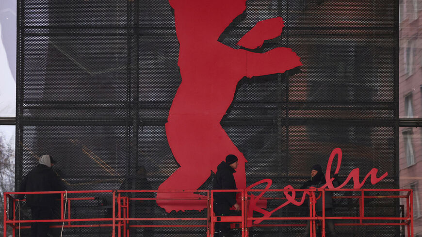 Workers mount the bear logo at the venue entrance of the "Berlinale Palast" for the upcoming Berlinale International Film Festival in Berlin, Germany, February 6, 2026. REUTERS/Liesa Johannssen