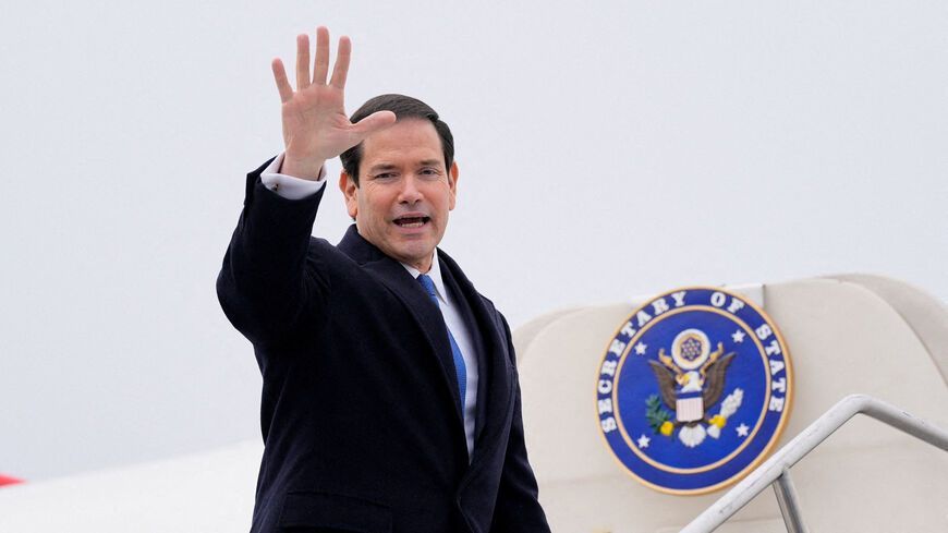 FILE PHOTO: U.S. Secretary of State Marco Rubio waves as he departs at the Liszt Ferenc International Airport in Budapest, Hungary, February 16, 2026.     Alex Brandon/Pool via REUTERS/File Photo