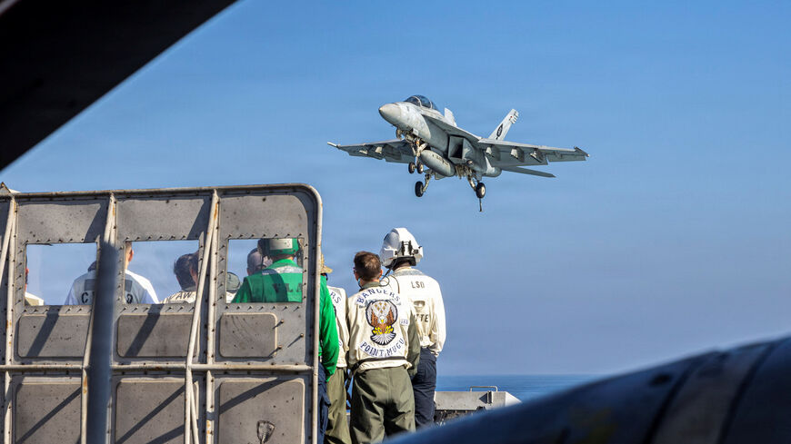 An F/A-18F Super Hornet prepares to make an arrested landing on the flight deck of the U.S. Navy's Nimitz-class aircraft carrier USS Abraham Lincoln (CVN 72) in the Arabian Sea February 15, 2026.  U.S. Navy/Mass Communication Specialist Seaman Daniel Kimmelman/Handout via REUTERS