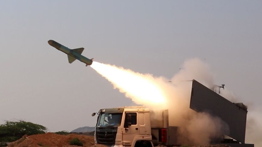 This handout photo released by Iran's Islamic Revolutionary Guards Corps's official website Sepanews shows a rocket being fired during a military exercise by the Guards and and the navy in the Strait of Hormuz