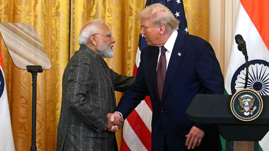 US President Donald Trump shakes hands with Indian Prime Minister Narendra Modi during a joint press conference in the East Room of the White House in Washington, on Feb. 13, 2025.
