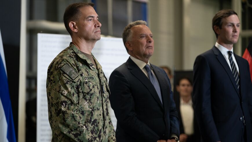 Steve Witkoff, US special envoy to the Middle East, (C) Adm. Brad Cooper, commander of the United States Central Command (CENTCOM), (L) and Jared Kushner listen as US Vice President JD Vance speaks.