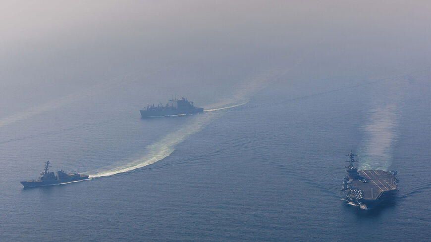 (EDITOR'S NOTE: This Handout image was provided by a third-party organization and may not adhere to Getty Images' editorial policy.) In this handout photo obtained from the U.S. Defence Department, Nimitz-class aircraft carrier USS Abraham Lincoln (CVN 72) sails alongside Arleigh Burke-class guided-missile destroyer USS Frank E. Petersen Jr. (DDG 121) and Lewis and Clark-class dry cargo ship USNS Carl Brashear (T-AKE 7) in the Arabian Sea, Feb. 6, 2026. According to the U.S. government, the Abraham Lincoln 