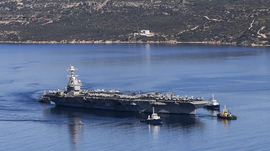 The US Navy aircraft carrier USS Gerald R. Ford departs Souda Bay on the island of Crete, on Feb. 26, 2026.