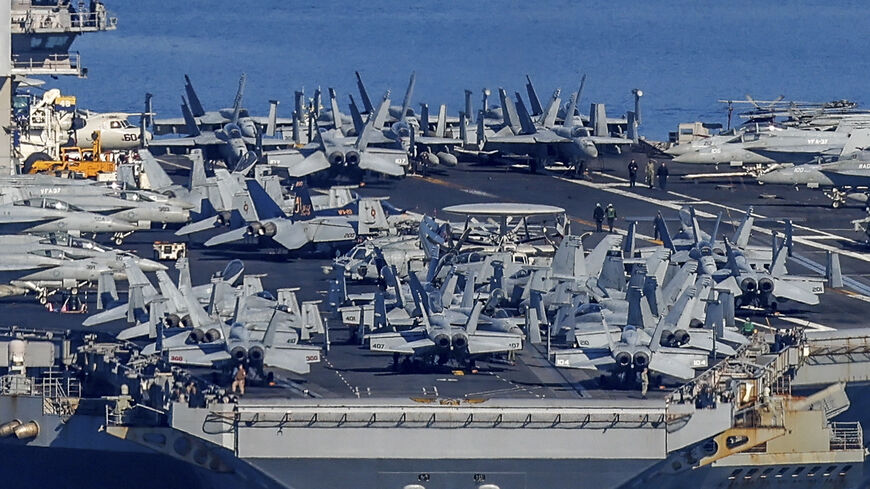 The US Navy aircraft carrier USS Gerald R. Ford departs Souda Bay on the island of Crete on February 26, 2026. (Photo by Costas METAXAKIS / AFP via Getty Images)