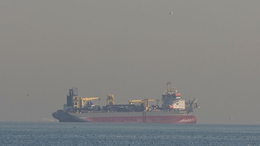 Qatar's state-run energy firm said it had halted liquefied natural gas production following Iranian attacks on facilities at two of its main gas processing bases