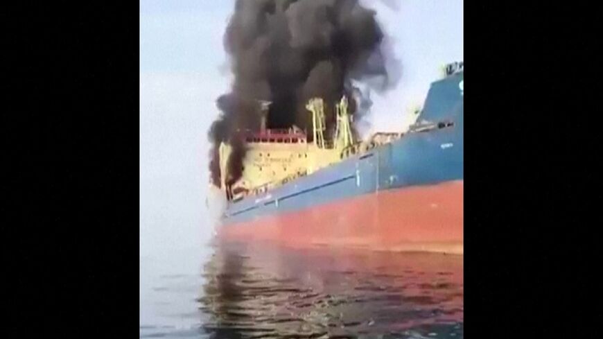 This video grab shows the Palau-flagged oil tanker Skylight, under US sanctions, engulfed in flames after being struck off the coast of Oman during the Middle East War