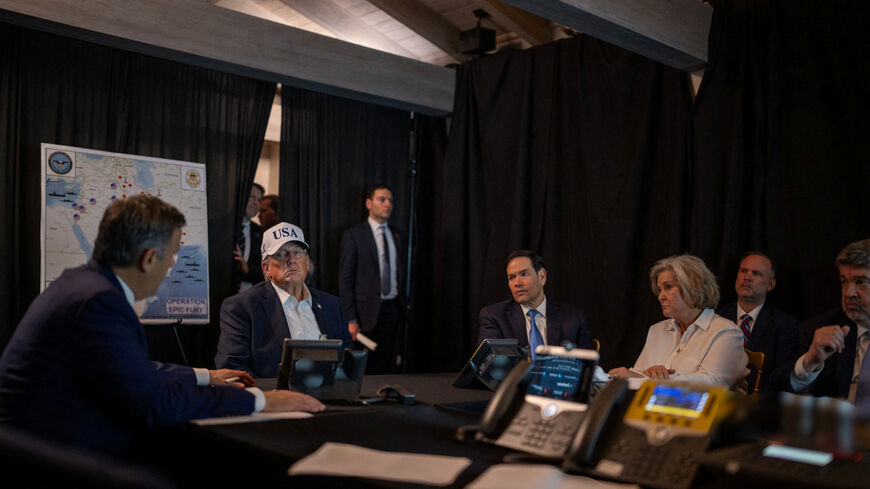 U.S. President Donald Trump speaks with CIA Director John Ratcliffe, accompanied by White House Chief of Staff Susie Wiles and Secretary of State Marco Rubio, during military operations in Iran, at Trump's Mar-a-Lago resort in Palm Beach, Florida, U.S. February 28, 2026.  The White House/Social Media/Handout via REUTERS