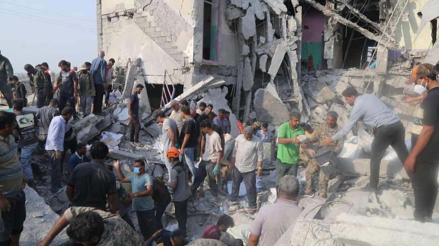 People and rescue forces work following an Israel strike on a school in Minab, Iran, February 28, 2026. Abbas Zakeri/Mehr News/WANA (West Asia News Agency) via REUTERS
